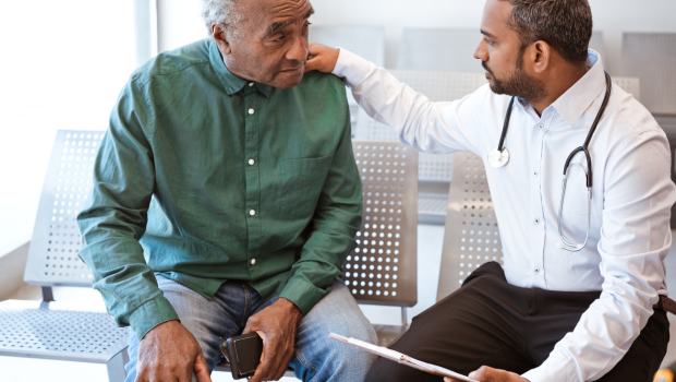 one stop, many services. man visiting with doctor